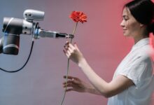 a robot holding a flower