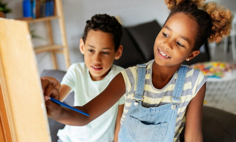 Concept of early childhood education, painting, talent, happy kids