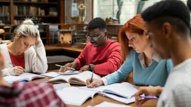 Group of university students studying together